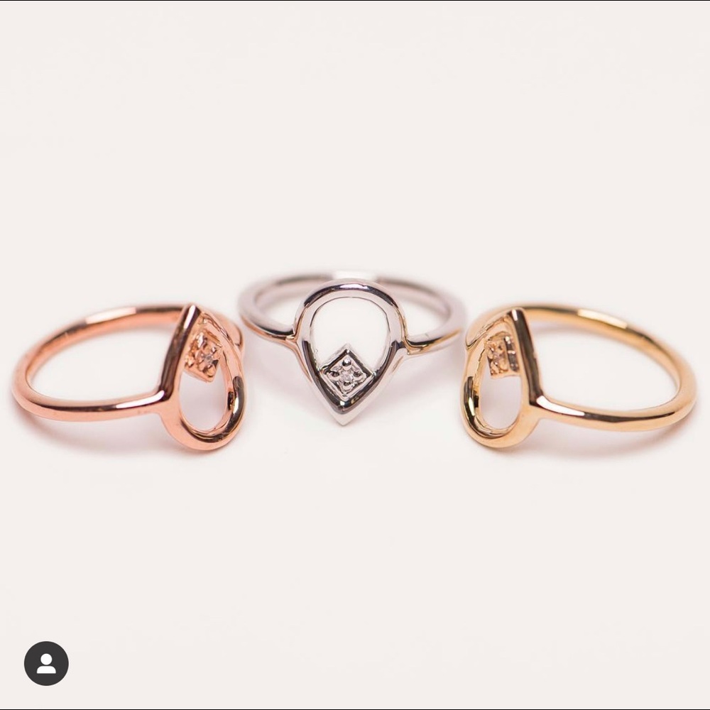 Open tear drop diamond ring